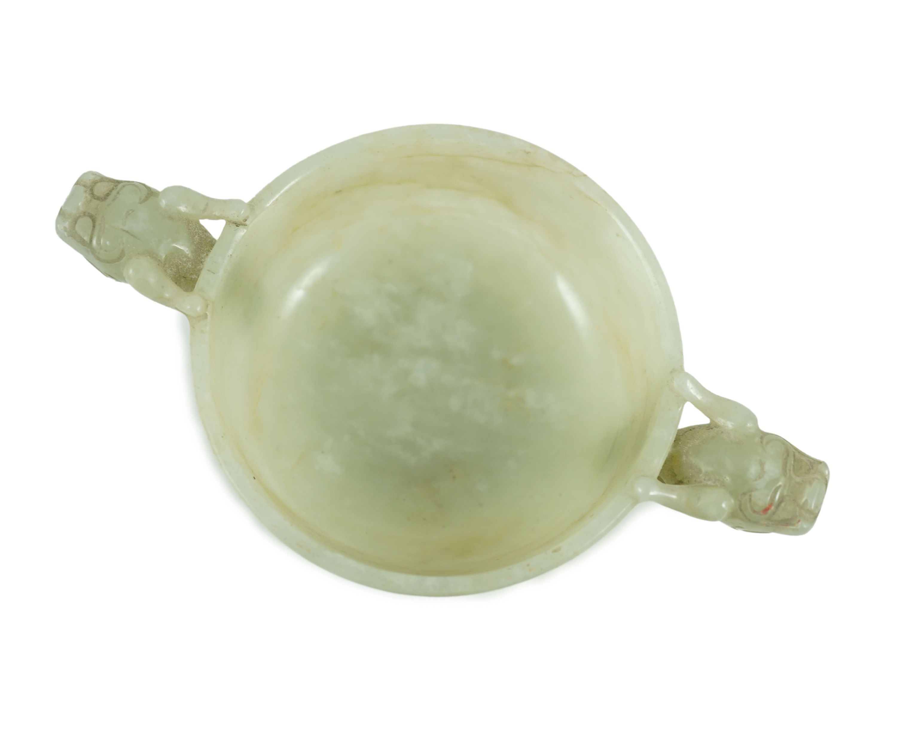 A Chinese pale celadon jade two handled ‘chilong’ cup, 17th/18th century, 13.2cm wide